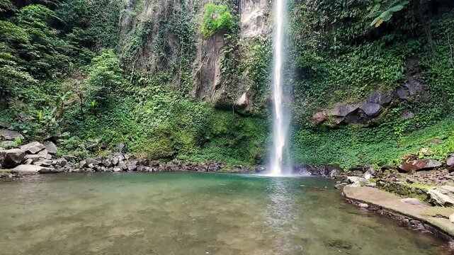Tropical Waterfalls Freshwater Scenic Bohol Panglao Philippines Camiguin travel turquoise blue waters Katibawasan Falls 