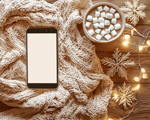Cozy winter scene with hot cocoa and phone