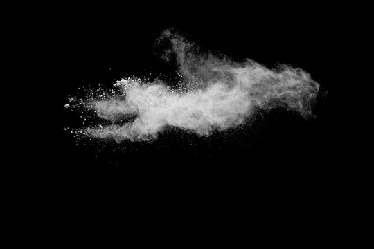 White cloud of powdery substance is floating in the air