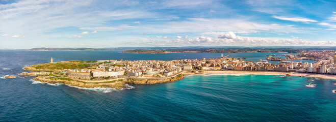 A Coruna city, aerial perspective. Old historic center of the city.  Panoramic aerial view of all Region. Famous travel destination in Galicia, northwest of Spain. Promenade and beach area of the city