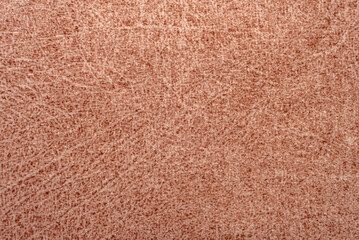 Texture of dense brown fabric for tailoring. Canvas. Textile. Material