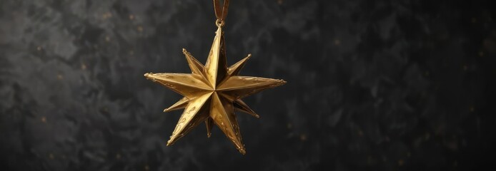 Elegant gold star ornament against dark surface, glamorous, celestial decor