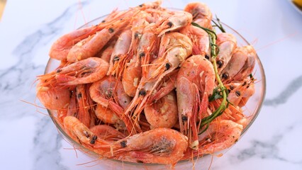 Perfectly seasoned shrimp with garlic and rosemary Culinary art brings out rich flavors of seafood blending aromatic herbs Freshly prepared food for gourmet lovers showcasing food presentation