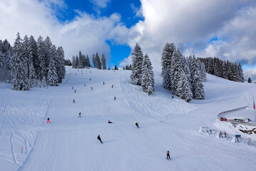 Snowy landscape with mountain panorama at ski resort Flumserberg in the Swiss Alps on a winter day. Photo taken January 29th, 2025, Flumserberg, Switzerland.