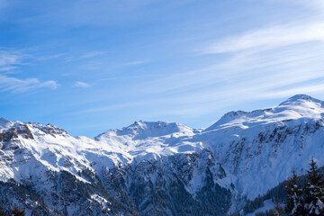 Snowy landscape with mountain panorama at ski resort Flumserberg in the Swiss Alps on a winter day. Photo taken January 29th, 2025, Flumserberg, Switzerland.