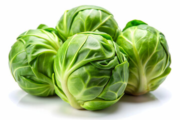 Obraz premium Fresh Brussels Sprouts: Four vibrant, fresh Brussels sprouts, nestled together, showcasing their bright green color and tight, firm leaves.