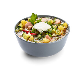 Bowl of tasty okroshka with sour cream on white background