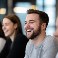 Fototapeta premium young man laughing in meeting