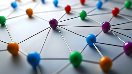 A network of multicolored spheres connected by thin black rods, symbolizing connectivity, communication, and relationships in a complex system.