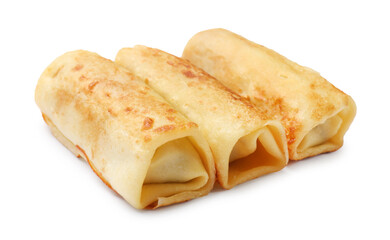 Three delicious rolled crepes isolated on white
