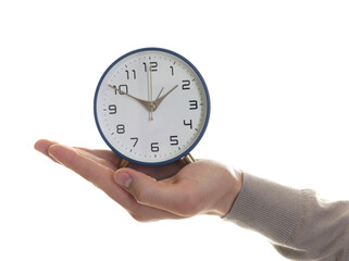 Man with alarm clock on white background, closeup
