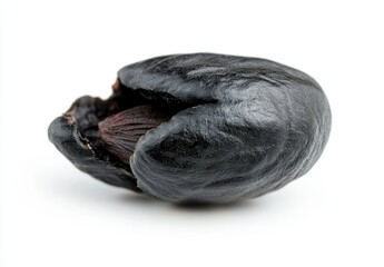 Obraz premium Single Black Seed with Shiny Surface Isolated on White Background