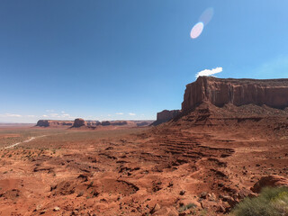 The timeless allure of Monument Valley captured in vibrant colors, where towering red rock formations meet the boundless horizon.
