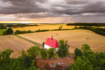 The Church of the Assumption of the Virgin Mary in Dobronice near Bechyně at sunset. South...