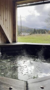 Relaxing soak in a mountain hot spring surrounded by nature