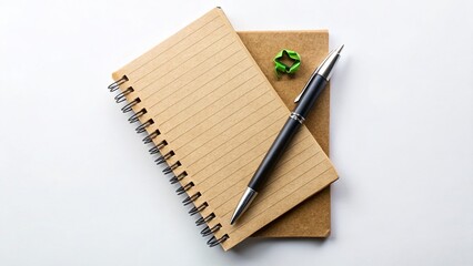 Recycled Paper Spiral Notebook & Pen - Eco-Friendly Stationery Mockup -  Drone Aerial View