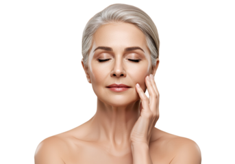 Gorgeous senior older woman with closed eyes touching her perfect skin, isolated