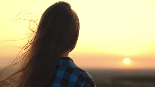 girl with long hair wind. smile child girl sunset. person breathes fresh air. eco. girl dream. teenager pray dawn. beautiful face long-haired girl wind close-up. clean air concept. breath nature park.