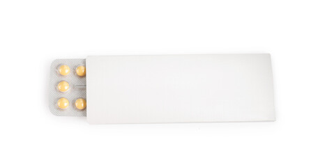 Blister of contraceptive pills in package isolated on white, top view. Mockup for design