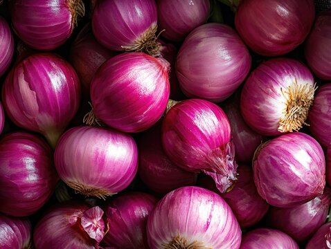 A large quantity of fresh red onions