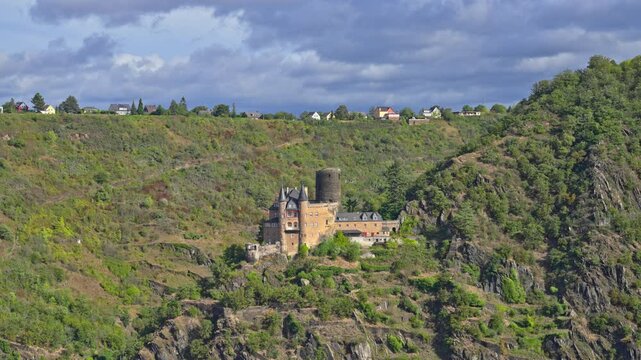 Historic Katz Burg Castle on the hillside of the Rhine River Valley with tracking movement, Sankt Goar, Germany