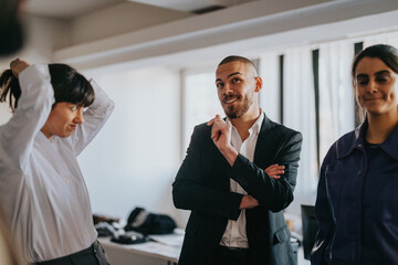 A group of business professionals collaborating in a modern office space, engaging in a productive meeting and exchanging ideas.