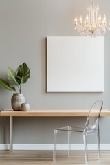Modern home office setup featuring a clear chair, minimalist desk, decorative vase with greenery, framed artwork, and stylish lighting for inspiration. Workspace decor.