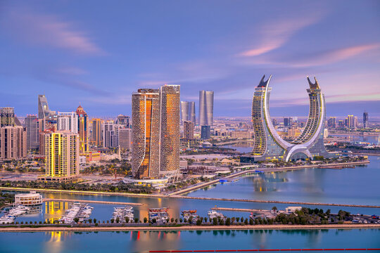 Lusail, Qatar - December 20, 2024: Katara buildings view from Lusail Marina Park. Crescent Tower 