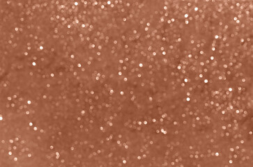 Mocha brown sequins background. Perfect texture for your design. Demonstrating color of 2025 year