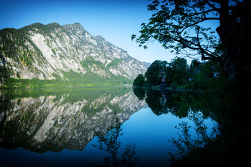 Mountains reflected in morning in the lake , Austria