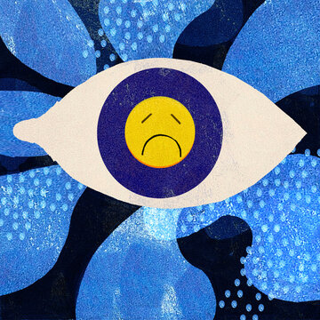Sad smiley face as pupil in eye