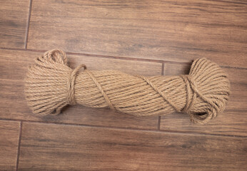 A coil of rope for a cat, a rope for a scratching post.