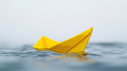 World Water Day clean crisis. yellow paper boat floating on calm water, symbolizing hope