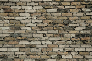 yellow and white brick wall close up