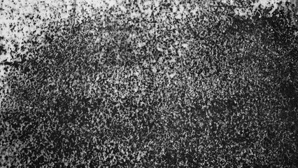 The photo shows a gray abstract background close-up