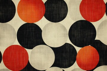 A fabric pattern featuring large circles in black, red, and white colors.