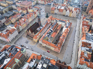 Fototapeta premium Wroclaw, Poland: Aerial view of the famous market square in Wroclaw medieval old town with the ancient town hall and church in Poland