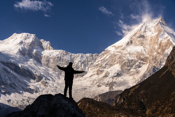 Trekker in front of Manaslu peak in Nepal