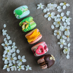 A variety of different macarons. A variety of colors and flavors of French almond dessert