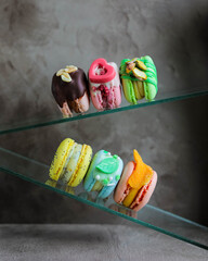 A variety of different macarons. A variety of colors and flavors of French almond dessert