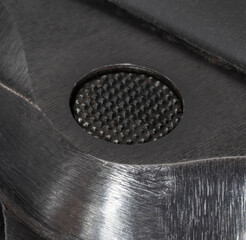 Gun position to release a magazine on a semi-automatic pistol with a metal frame.