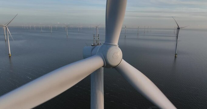 Offshore windpark wind turbines at Breezanddijk, afsluitdijk, The Netherlands.