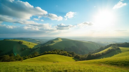 Naklejka premium Serene Landscape of Rolling Green Hills Under Blue Sky and Sunlight