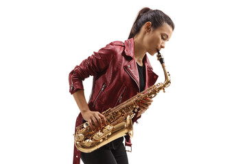 Young woman in a leather jacket playing a saxophone