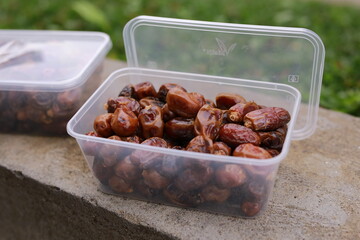 Dried dates in plastic box