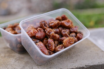 Dried dates in plastic box
