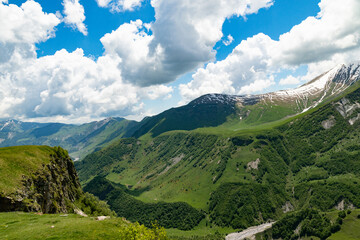the landscape of mountains in Georgia.Snow-capped mountain peaks against a blue sky