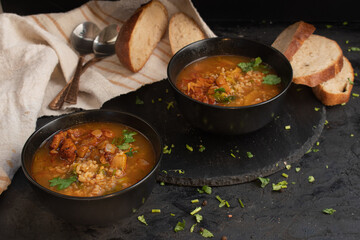 Vegan soup in black bowl