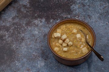 Vegan creamed soup with croutons, copy space