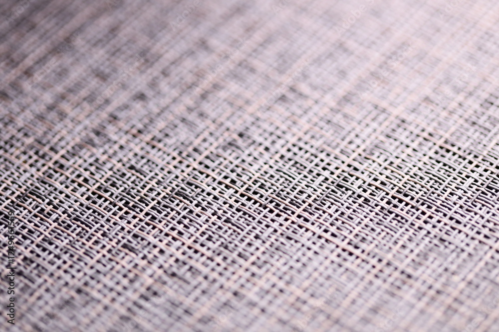 Poster A close up shot of a piece of fabric with intricate texture and pattern.